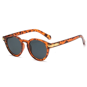 Classic retro round leopard print sunglasses with gold metal accents and dark grey lenses