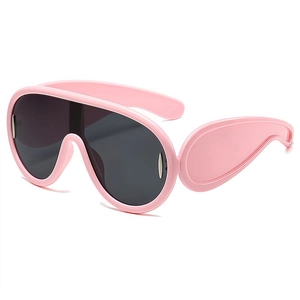 Pink oversized wrap around shield sunglasses with futuristic cyber design and dark lenses
