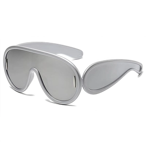 Modern futuristic oversized silver wrap-around sunglasses with a sleek metallic finish