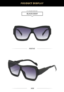 Detailed views of oversized black sunglasses with thick frames and purple gradient lenses