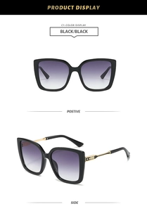 Detail of square oversized sunglasses featuring golden metal temples and star-embossed patterns