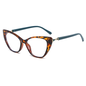 Monture de lunettes œil-de-chat écaille avec branches bleu sarcelle et détails dorés
