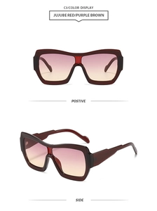 Front and side views of vintage oversized dark red sunglasses with gradient lenses