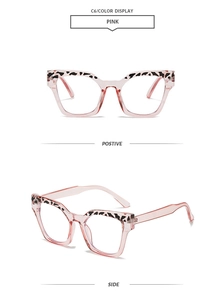 Detail view of pink cat-eye glasses frame with leopard print accents and side temples