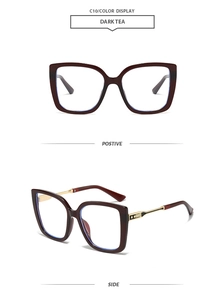 Detail of square oversized dark tea sunglasses featuring metal temples with star embossing