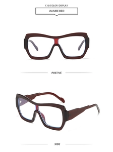 Detail view showing the jujube red oversized retro sunglasses from positive and side angles