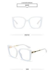 Detail view of white square sunglasses with gold star accents on the metal hinges