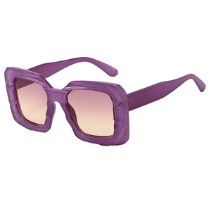 Modern purple translucent square frame sunglasses with gradient lenses in a 45-degree view