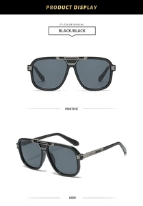 Detail of square black metal sunglasses with textured gunmetal bridge and temple hinges