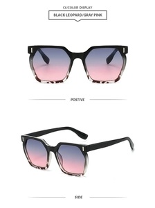 Detail view of retro square sunglasses featuring black leopard frames and gray pink lenses