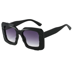 Fashionable oversized square sunglasses with black geometric frame and purple gradient lenses