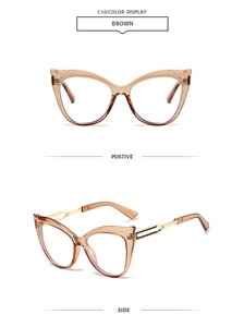 Detail view of brown cat eye sunglasses with golden geometric metal hollow temples