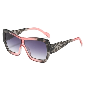 Retro oversized square sunglasses with pink tortoiseshell frame and purple gradient lenses