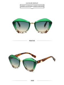 Detail view of green leopard cat eye sunglasses with textured frames and gradient lenses