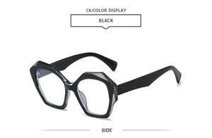 Side view of black polygon sunglasses frame with subtle blue reflective lenses