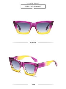 Detail of square cat-eye sunglasses with purple yellow gradient frames and gray lenses