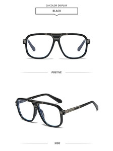 Detail view of square pilot sunglasses with matte black frames and silver metal bridge