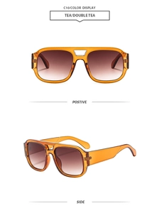 Classic double-bridge amber sunglasses with tea gradient lenses in front and side views