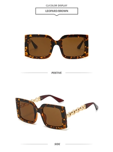 Detail view of leopard print square sunglasses featuring golden metal chain temples
