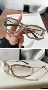 Detail of silver rectangle sunglasses with double-row rhinestones and gradient lenses