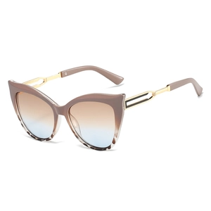 Fashionable cat eye sunglasses with metal hollow temples and gradient khaki lenses