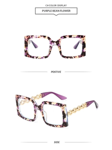 Detailed front and side views of purple floral square sunglasses with gold chain temples