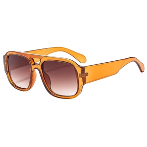 Classic double-bridge aviator sunglasses with amber frames and brown gradient lenses