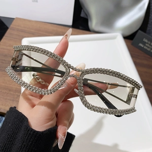 Chic silver oversized cat-eye sunglasses with rhinestone frames and clear lenses for women