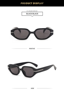 Detail view of black irregular cat-eye sunglasses with silver metal decorative accents