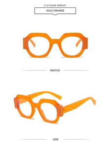 Detail view of jelly orange geometric oversized sunglasses with thick frame design