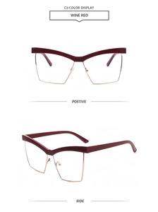 Detail of wine red cat-eye glasses frame with metal half-rim and geometric browline design