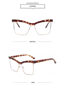 Detail view of semi-rimless browline glasses in flower tortoiseshell and gold metal frame
