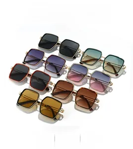 Detailed display of vintage square oversized sunglasses in various gradient lens colors