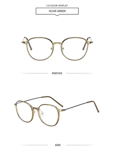 Detail view of olive green eyewear frames with transparent finish and slim metal temples