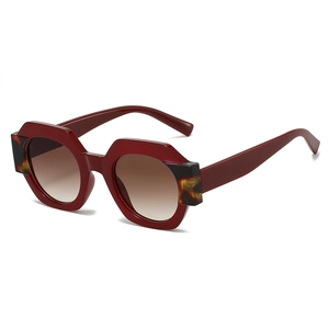 Burgundy geometric sunglasses with tortoise accents and gradient brown lenses