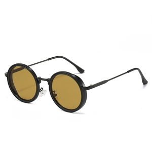 Retro round black frame sunglasses with amber lenses, fashionable vintage style eyewear