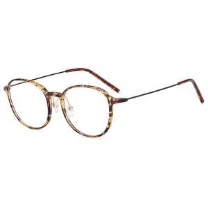 Retro tortoiseshell round glasses frame with slim black metal temples on white background