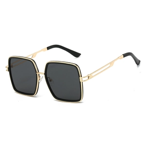 Classic oversized square sunglasses with gold metal frame and black detailing