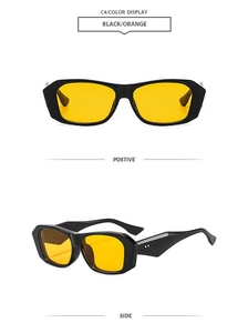 Detail view of vintage chunky black frame sunglasses with vibrant orange tinted lenses