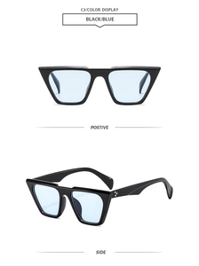 Front and side views of vintage large frame sunglasses with blue lenses and black frames
