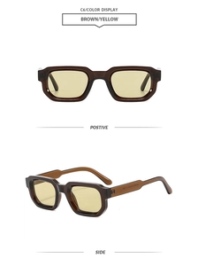 Detail of vintage square brown frame sunglasses with yellow lenses and thick temples