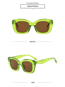 Front and side views of green cat-eye sunglasses with thick frames and brown lenses