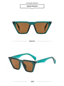 Green oversized polygon sunglasses with brown lenses and side metal rivet details