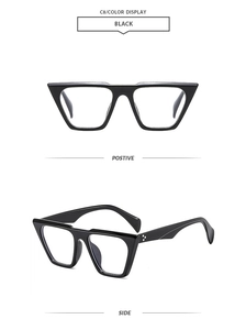 Detailed view of black chunky frame sunglasses with silver diamond accents on the hinge