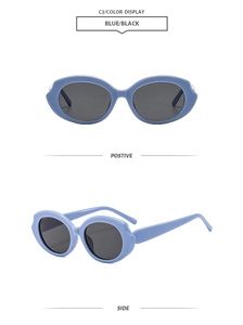 Detail view of oval blue frame sunglasses with dark lenses from front and side angles
