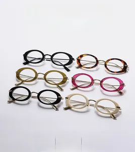 Modern oval eyeglasses frames in multiple colors including black and tortoiseshell