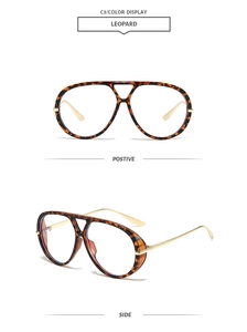 Detail of leopard print pilot frames and gold metal temples on retro glasses