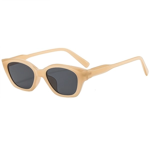 Classic beige cat eye sunglasses with grey lenses and gold logo detail for women