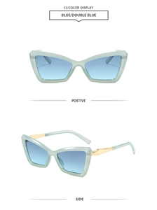 Detail view of stylish blue cat-eye sunglasses with gold metal hinges and gradient lenses