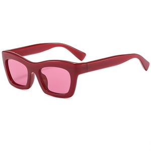 Classic vintage cat-eye sunglasses with thick burgundy frames and pink gradient lenses
